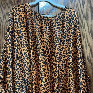 A tiger dishdasha, size large, that you can wear on holidays